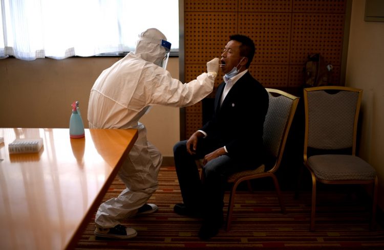 China impulsa una operación de test masivos tras 137 nuevos casos en el noroeste. FOTO/ Noel Celis / AFP