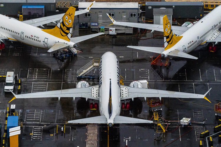 RENTON, WA - NOVEMBER 18: Boeing 737 Max airplanes sit parked at the company's production facility on November 18, 2020 in Renton, Washington. Today, the U.S. Federal Aviation Administration (FAA) cleared the Max for flight after 20 months of grounding. The 737 Max has been grounded worldwide since March 2019 after two deadly crashes in Indonesia and Ethiopia.   David Ryder/Getty Images/AFP