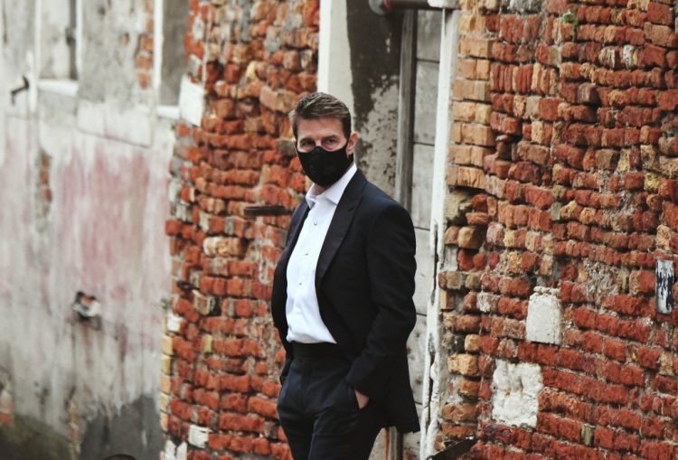US actor Tom Cruise looks on during the shooting of the movie "Mission Impossible: Lybra" in Venice on October 20, 2020. (Photo by ANDREA PATTARO / AFP)