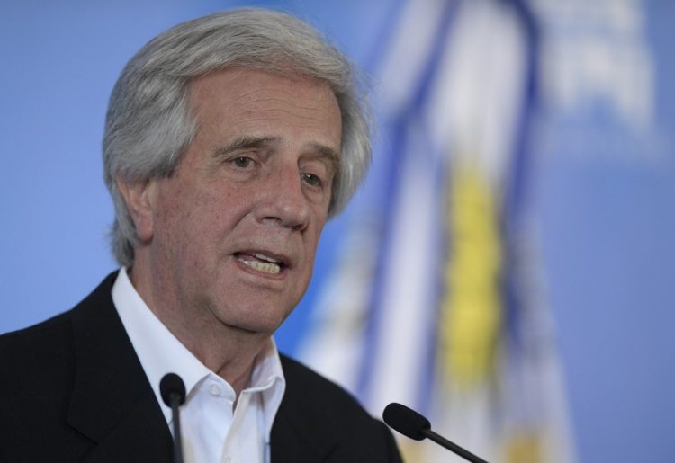 (FILES) In this file picture taken on October 24, 2016, (then) Uruguay's President Tabare Vazquez speaks during a press conference held along with his Argentine counterpart Mauricio Macri after a working meeting at the presidential residence in Olivos, Buenos Aires. - Left-wing Vazquez, who ruled Uruguay in the 2005-2010 and 2015-2020 periods and was treated for lung cancer in 2019, is in a delicate condition after suffering a relapse, according to reports in the local media on November 27, 2020. (Photo by Juan MABROMATA / AFP)
