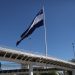 Alcalde Ernesto Muyshondt iza bandera de $360 mil en el Redondel Masferrer de San Salvador