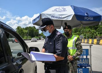 Récord de nuevos casos de COVID-19 en Malasia, el sistema de salud desbordado