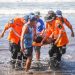 ¡Las olas los esperan! Los nadadores están listos para Natación para la Convivencia 2022 en playa El Zonte