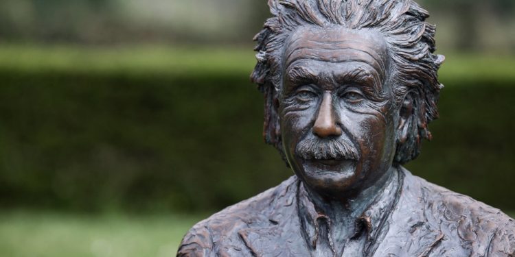 A statue by Belgian artist Johnny Werbrouck depicting late German scientist Albert Einstein is seen on April 20, 2023 in De Haan, near the villa "Savoyarde" where he lived for six months in 1933 after leaving Germany. (Photo by Kenzo TRIBOUILLARD / AFP) / RESTRICTED TO EDITORIAL USE - MANDATORY MENTION OF THE ARTIST UPON PUBLICATION - TO ILLUSTRATE THE EVENT AS SPECIFIED IN THE CAPTION