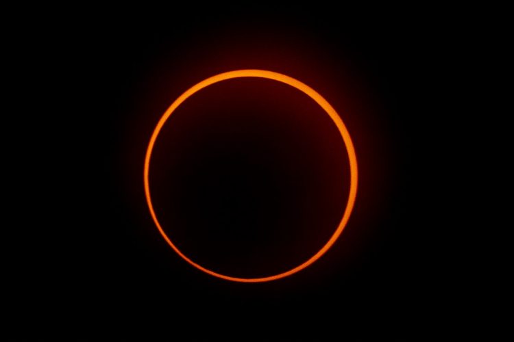 The "Ring of Fire" effect caused during the annular solar eclipse is seen from Penonome, Panama, on October 14, 2023. (Photo by Luis Acosta / AFP)