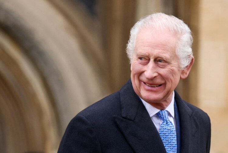 Britain's King Charles III reacts as he leaves St. George's Chapel, in Windsor Castle, after attending the Easter Mattins Service, on March 31, 2024. (Photo by Hollie Adams / POOL / AFP)