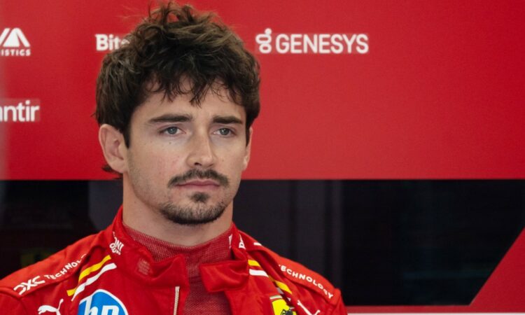Ferrari's Monegasque driver Charles Leclerc prepares in the garage for the first practice session at the Autodromo Internazionale Enzo e Dino Ferrari race track in Imola, Italy, on May 17, 2024, ahead of the Formula One Emilia Romagna Grand Prix. (Photo by ANDREJ ISAKOVIC / AFP)
