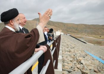 A handout picture provided by the Iranian presidency on May 19, 2024, shows Iran's President Ebrahim Raisi(L) and his Azeri counterpart Ilham Aliyev meeting at the site of Qiz Qalasi, the third dam jointly built by Iran and Azerbaijan on the Aras River, ahead of its inauguration ceremony. A helicopter in the convoy of the Iranian president was involved in "an accident" in East Azerbaijan province on May 19, state televsion reported, without specifying if the president was on board. (Photo by Iranian Presidency / AFP) / === RESTRICTED TO EDITORIAL USE - MANDATORY CREDIT "AFP PHOTO / HO / IRANIAN PRESIDENCY" - NO MARKETING NO ADVERTISING CAMPAIGNS - DISTRIBUTED AS A SERVICE TO CLIENTS ===