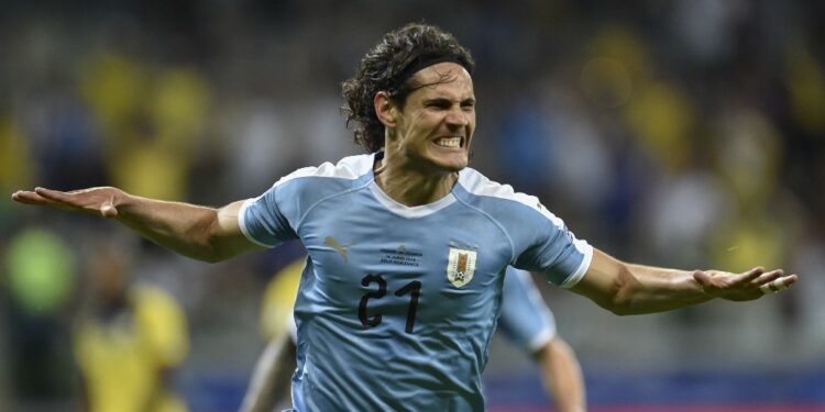 (FILES) Uruguay's Edinson Cavani celebrates after scoring against Ecuador during their Copa America football tournament group match at the Mineirao Stadium in Belo Horizonte, Brazil, on June 16, 2019. Cavani announced on May 30, 2024, on his social networks that he is resigning from the Uruguayan national team after 16 years, 136 caps and four world cups. (Photo by Douglas MAGNO / AFP)