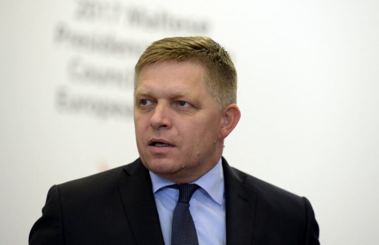 Slovakian Prime Minister Robert Fico leaves the European Council, in Brussels, following the European Union leaders summit on June 23, 2017. (Photo by THIERRY CHARLIER / AFP)