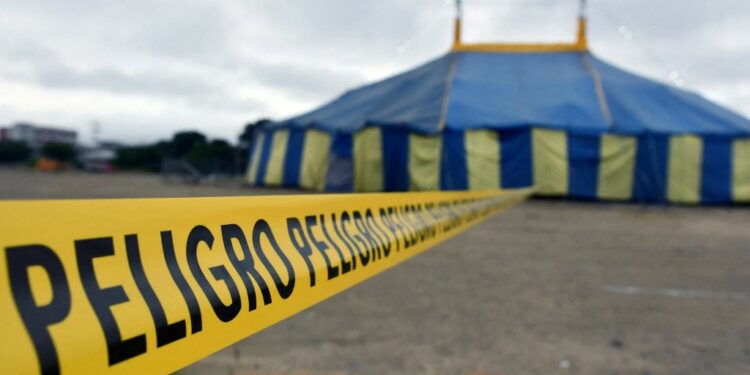 View outside a circus in La Poza in Manta, Ecuador, on June 3, 2024, where Ecuadorean assembly member and social media influencer Cristhian Nieto and his wife were shot dead on the eve. The deputy legislator, from the opposition party Revolución Ciudadana, and his wife Nicole Burgos were attending the circus performance when a group of armed men entered the back of the tent and opened fire. (Photo by Ariel Ochoa / AFP)