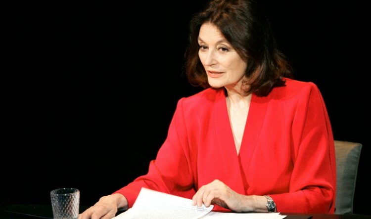 (FILES) French actress Anouk Aimee rehearses a scene from the play Love Letters, directed by French actress and director Sandrine Dumas, at the Theatre de la Madeleine in Paris, on September 5, 2005. French screen star Anouk Aimee, who became an icon of doomed romance in the 1960s thanks to the Oscar-winning "A Man and A Woman", died at 92, on June 18, 2024, her agent told AFP. Aimee's sultry sophistication graced such arthouse European masterpieces as Federico Fellini's "La Dolce Vita" (1960) and "8 1/2" (1963). (Photo by PIERRE VERDY / AFP)