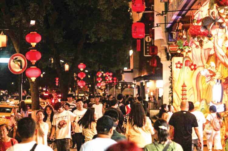 Todas las noches las
calles de Nanjing se llenan
de turistas.